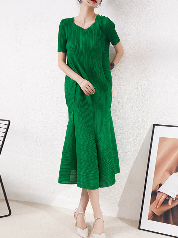 Robe mi-longue ample plissée taille haute, à col rond, couleur unie