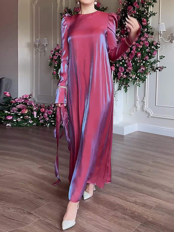 Robe longue plissée coupe trapèze, à manches longues, à taille nouée, à fermeture éclair, à col rond, couleur unie