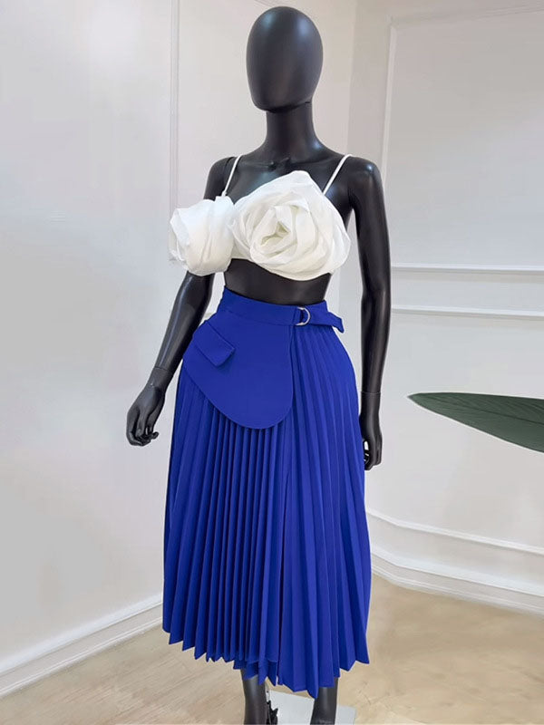 Jupe asymétrique plissée coupe trapèze, taille haute, à empiècements, couleur unie