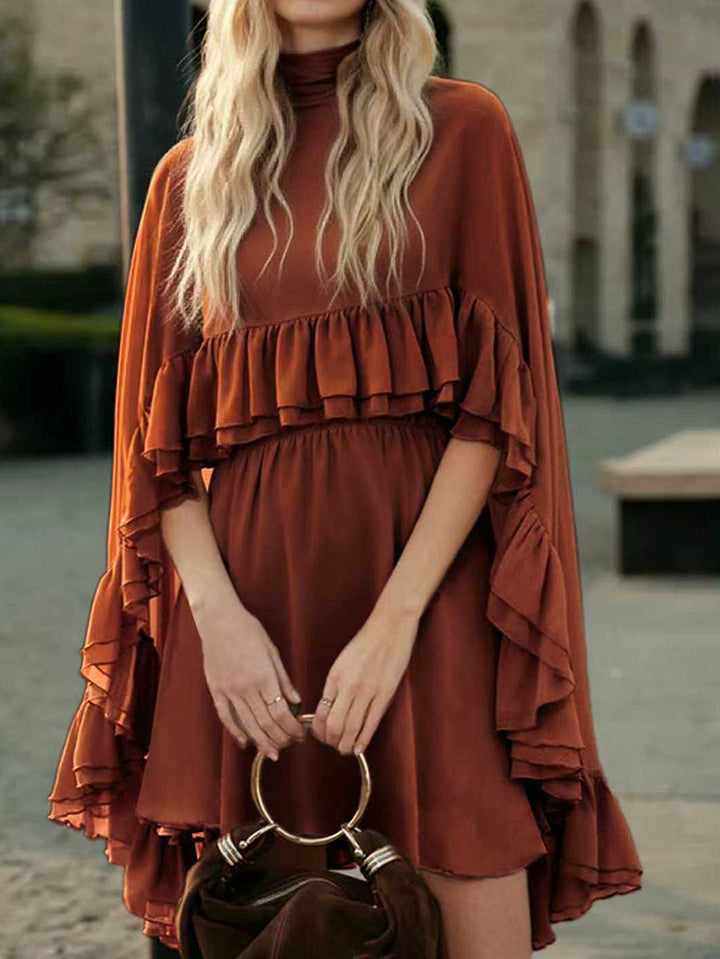 Robe courte ensemble deux pièces plissée volantée nouée taille haute, sans manches, à empiècements, à col cheminée, couleur unie