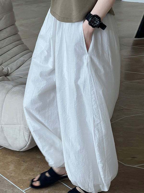 Pantalon taille haute, à taille élastique, à empiècements, couleur unie