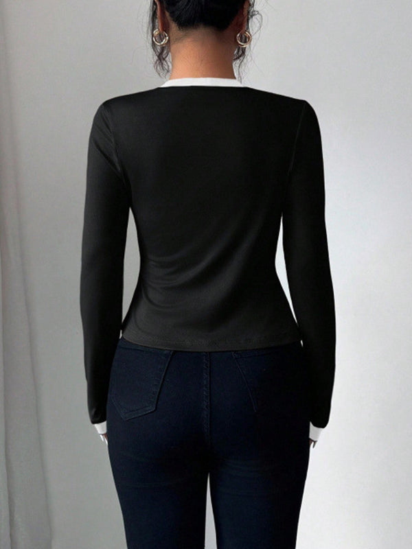 Ensemble deux pièces à manches longues, à empiècements, sans col, couleur unie