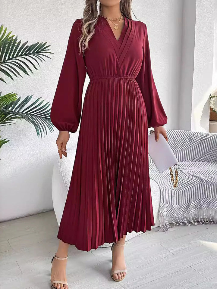 Robe longue plissée coupe trapèze, taille haute, à taille élastique, à col en V, couleur unie