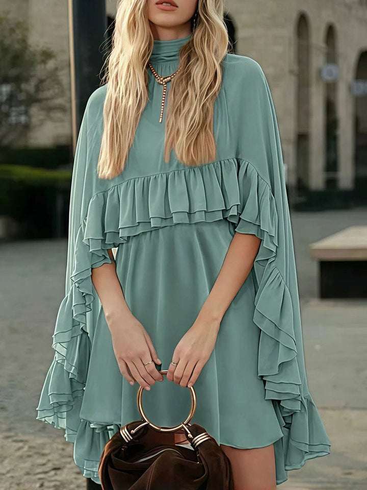 Robe courte ensemble deux pièces plissée volantée nouée taille haute, sans manches, à empiècements, à col cheminée, couleur unie