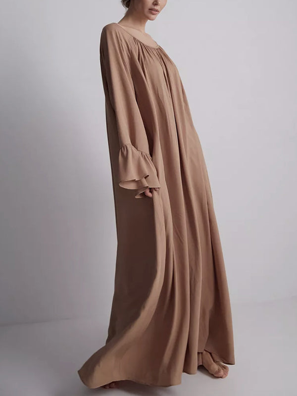 Robe longue plissée coupe trapèze, à manches évasées, à empiècements, à col rond, couleur unie