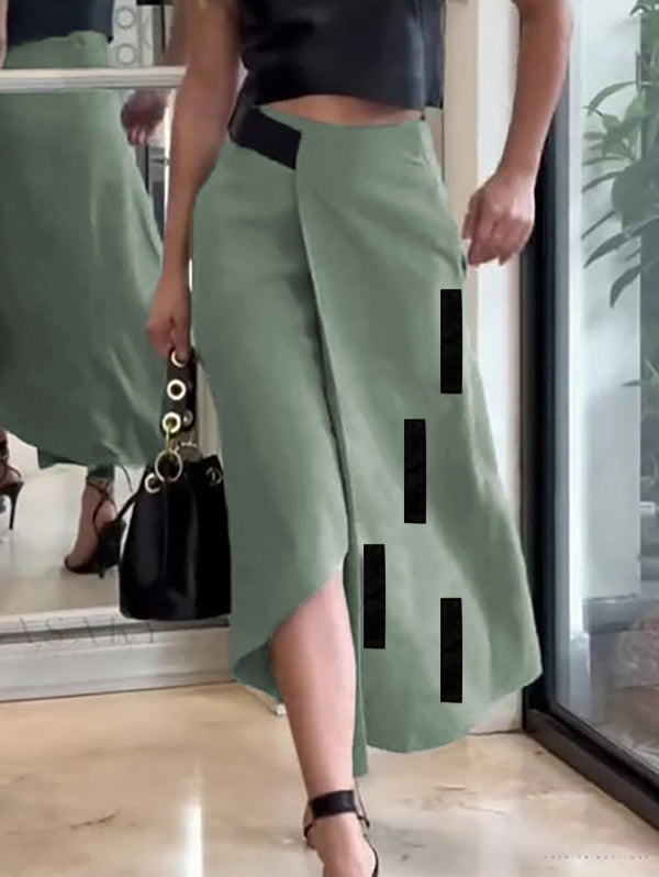 Jupe ample asymétrique coupe trapèze, à taille élastique, à poches, à empiècements