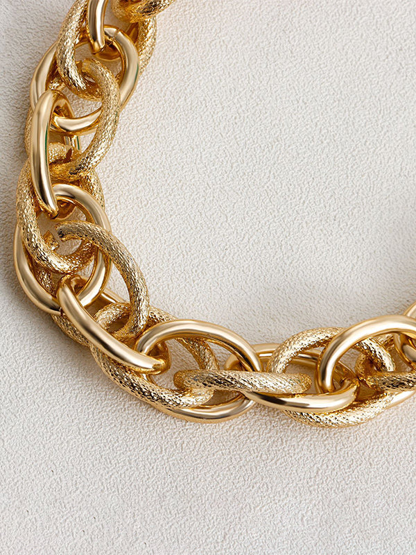 Parure collier et bracelet ajourée couleur unie