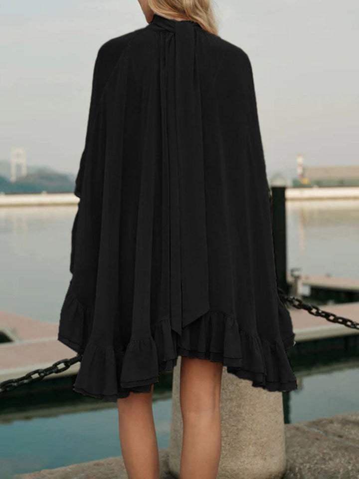 Robe courte ensemble deux pièces plissée volantée nouée taille haute, sans manches, à empiècements, à col cheminée, couleur unie