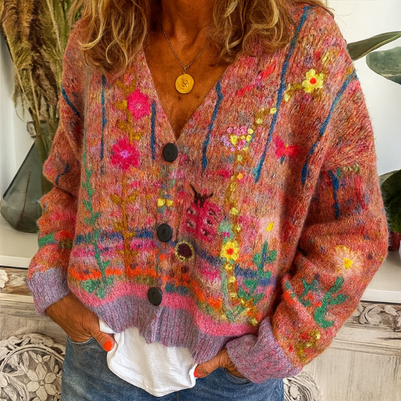 Gilet pour femmes à boutons avec motif floral coloré et décolleté en V