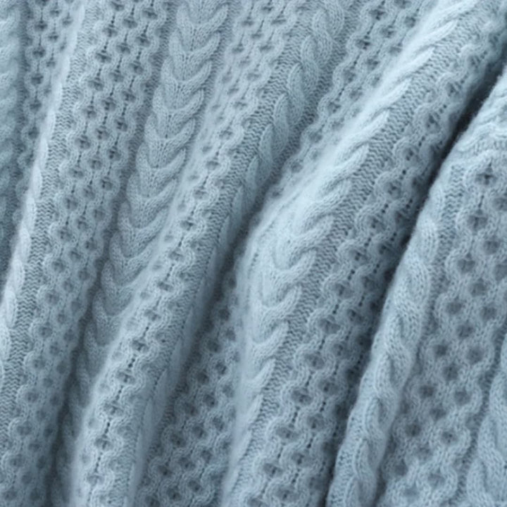 Pull à col roulé pour femmes avec motif en torsades