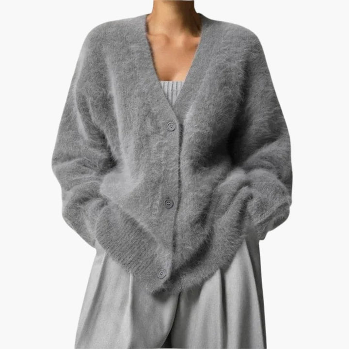 Gilet pour femmes avec patte de boutonnage et manches longues