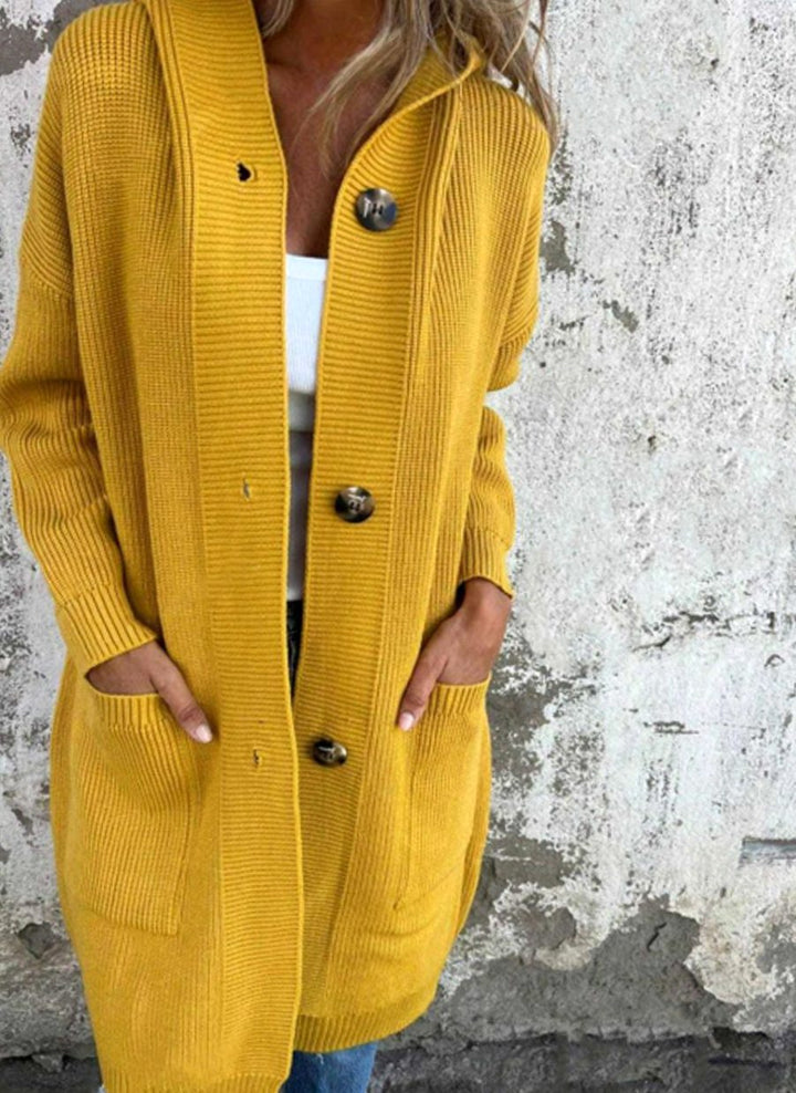 Manteau long en tricot pour femmes avec capuche et patte de boutonnage Cardigan élégant pour l'automne et la mi-saison