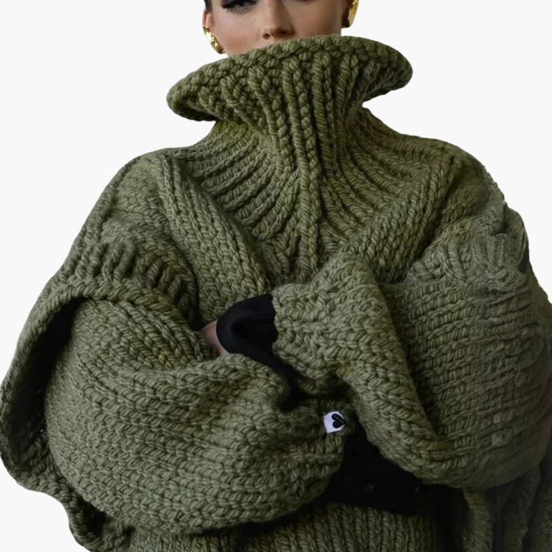 Pull femme avec col roulé oversize et ourlet côtelé
