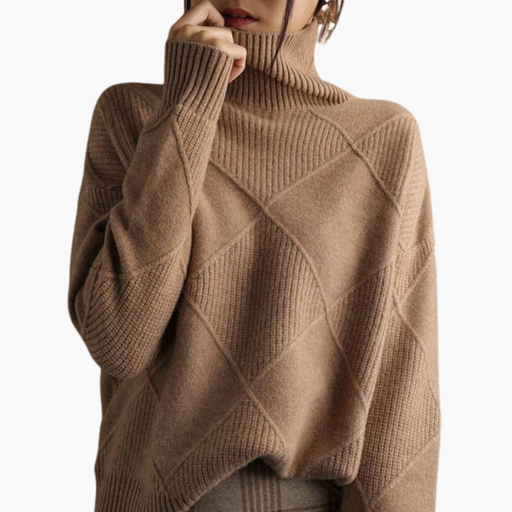 Pull pour femmes avec col roulé et inserts structurés