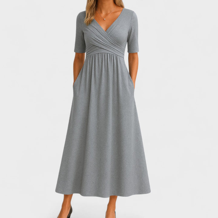 Robe midi élégante pour femmes - Décolleté en V, manches 3/4, poches pratiques