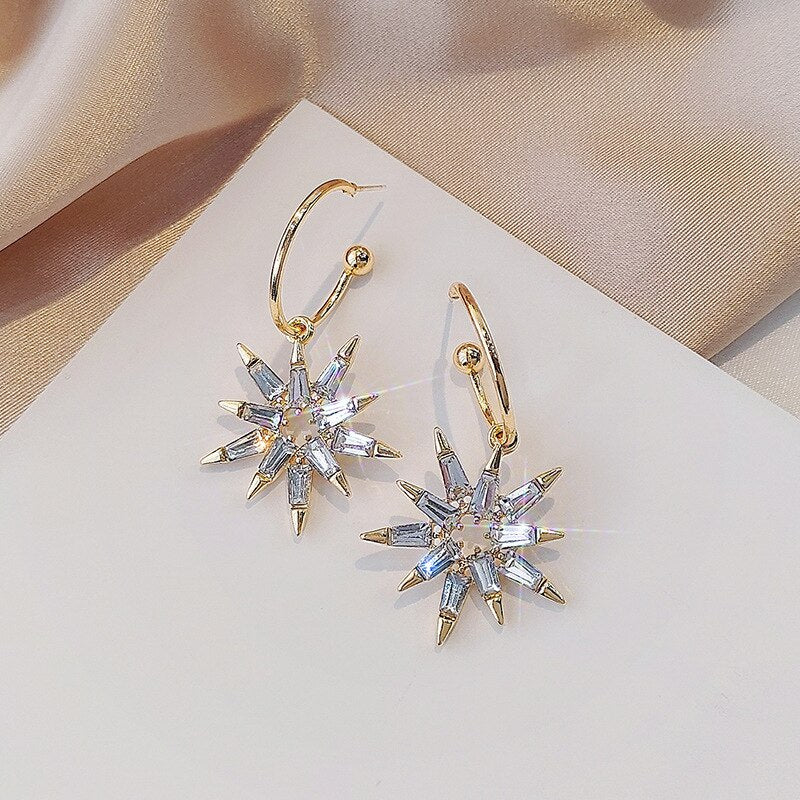 Boucles d'oreilles étoile en or et argent