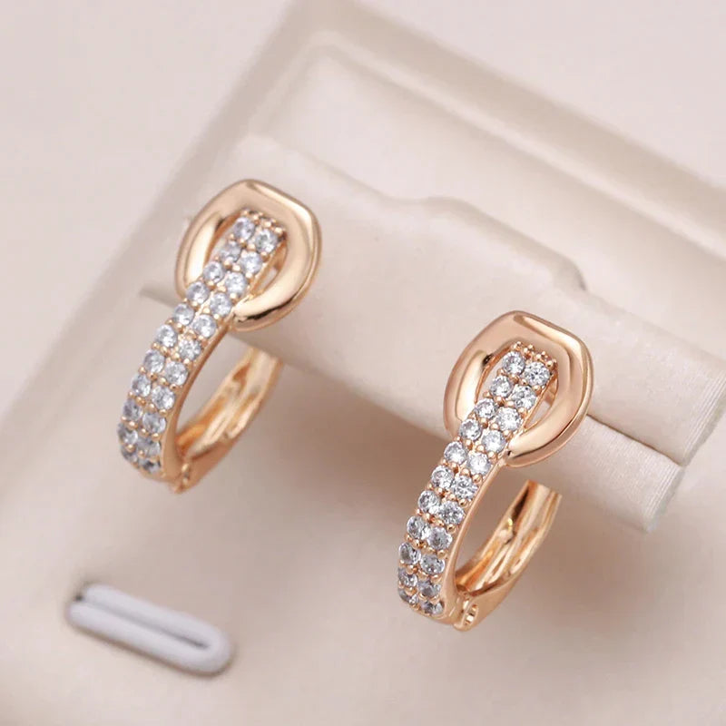 Boucles d'oreilles élégantes avec zirconia incrusté en or