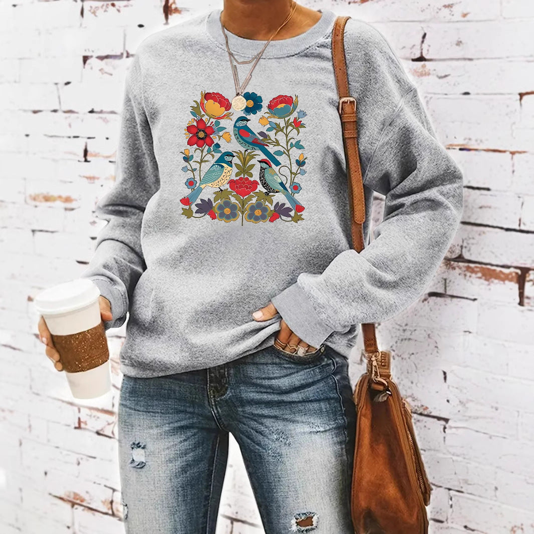 Sweat-shirt pour femmes avec motif floral d'oiseau et coupe décontractée