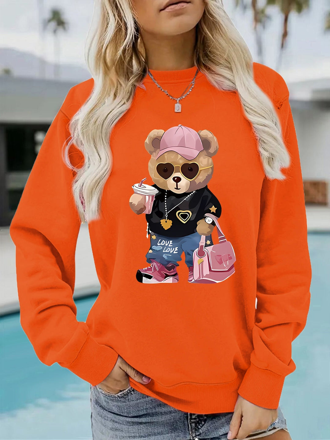 Sweatshirt pour femmes avec un motif unique de ours en cartoon et une inscription à la mode