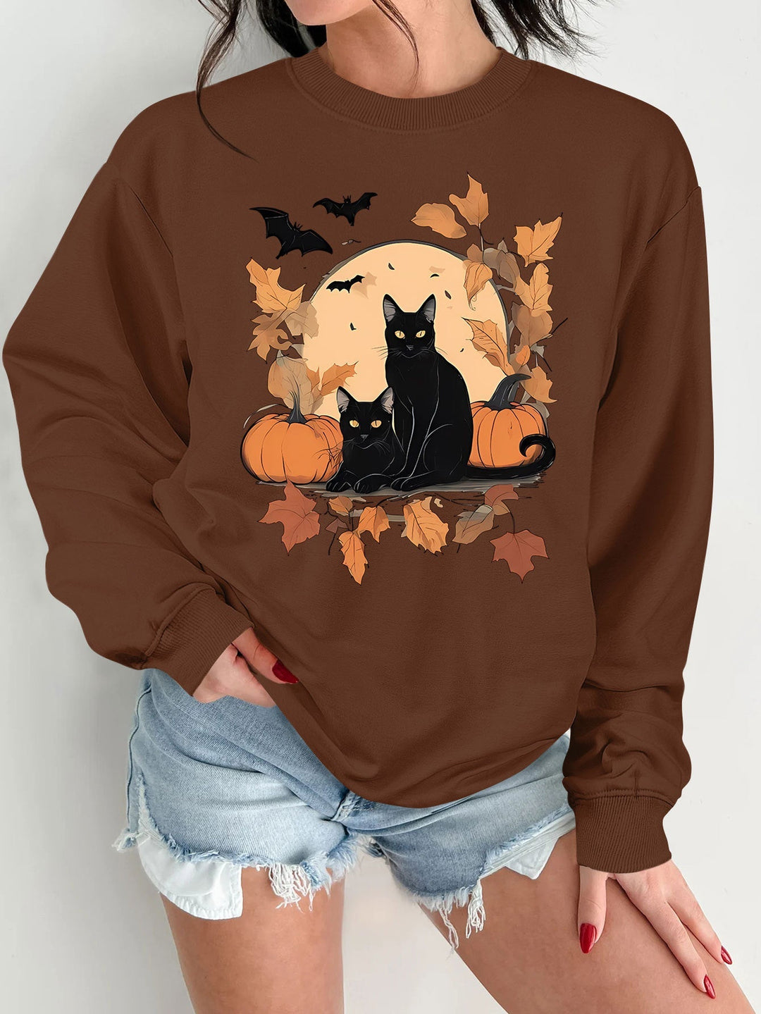 Sweatshirt pour femmes avec un design automnal de chats et de citrouilles