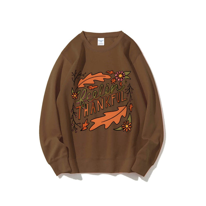 Sweatshirt pour femmes avec motif automnal coloré et inscription inspirante
