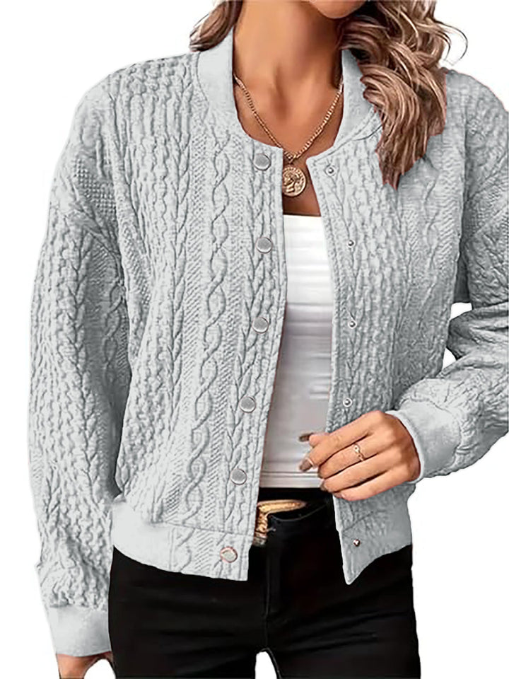 Gilet pour femmes au design moderne en torsades avec fermeture à boutons-pression