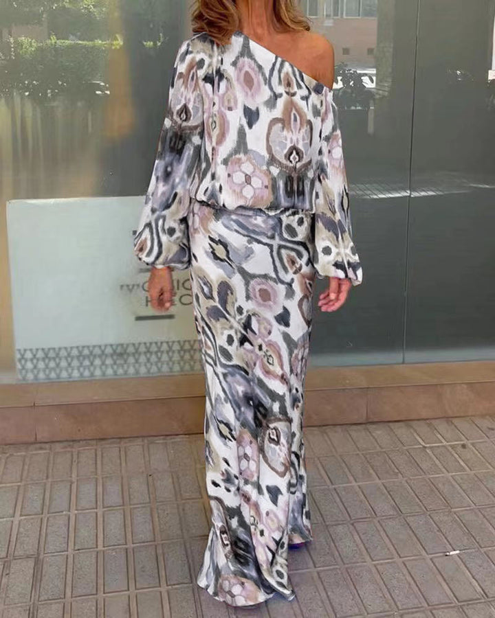 Robe maxi élégante pour femmes avec une coupe asymétrique et des manches fluides