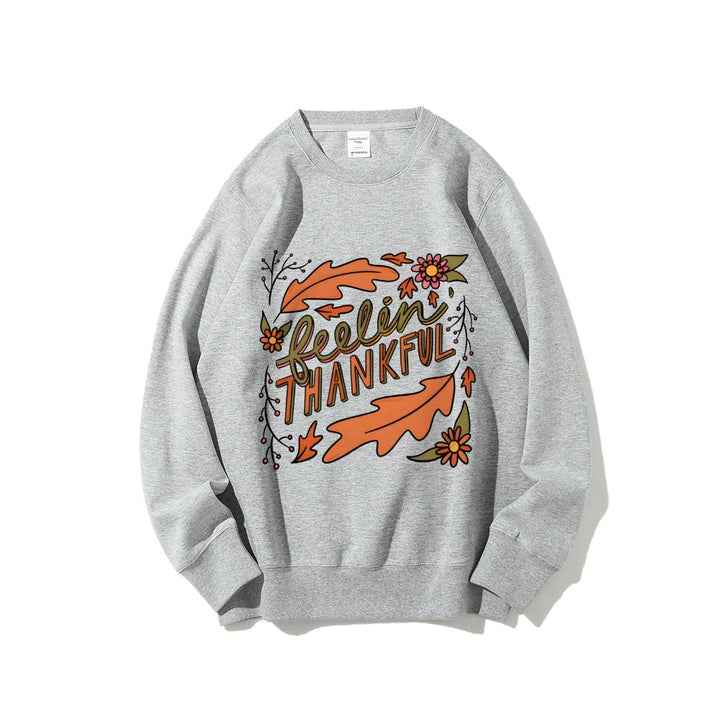 Sweatshirt pour femmes avec motif automnal coloré et inscription inspirante
