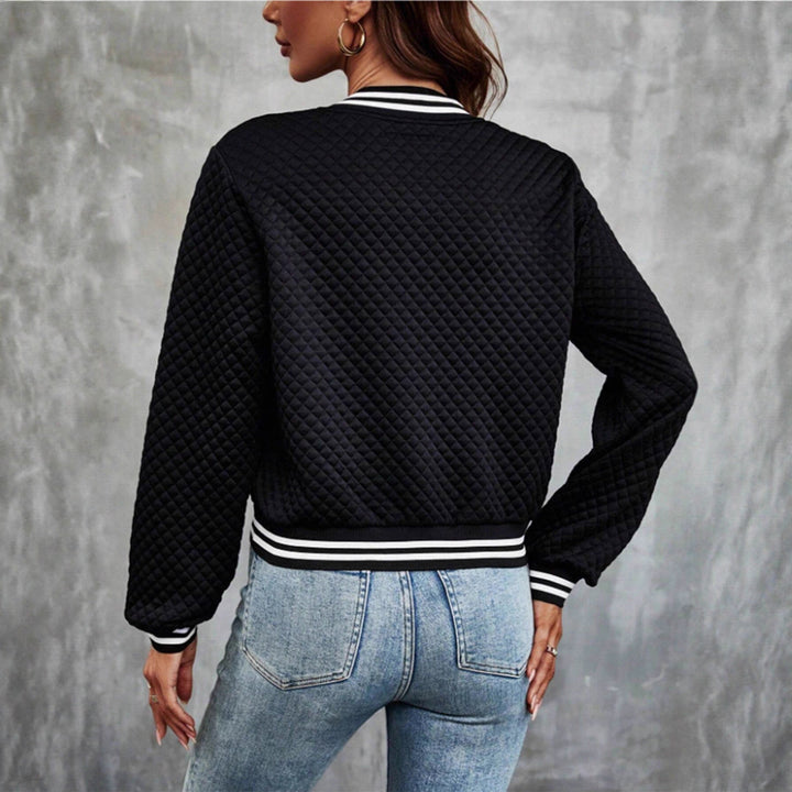 Veste matelassée pour femmes au design sportif avec des manches contrastées