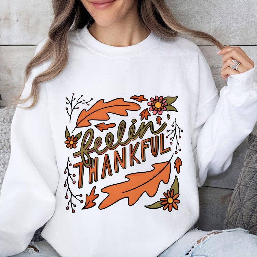 Sweatshirt pour femmes avec motif automnal coloré et inscription inspirante