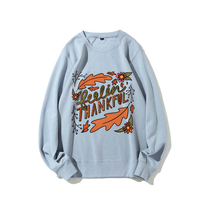 Sweatshirt pour femmes avec motif automnal coloré et inscription inspirante