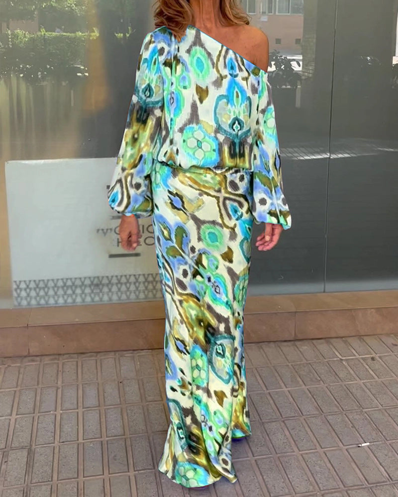 Robe maxi élégante pour femmes avec une coupe asymétrique et des manches fluides