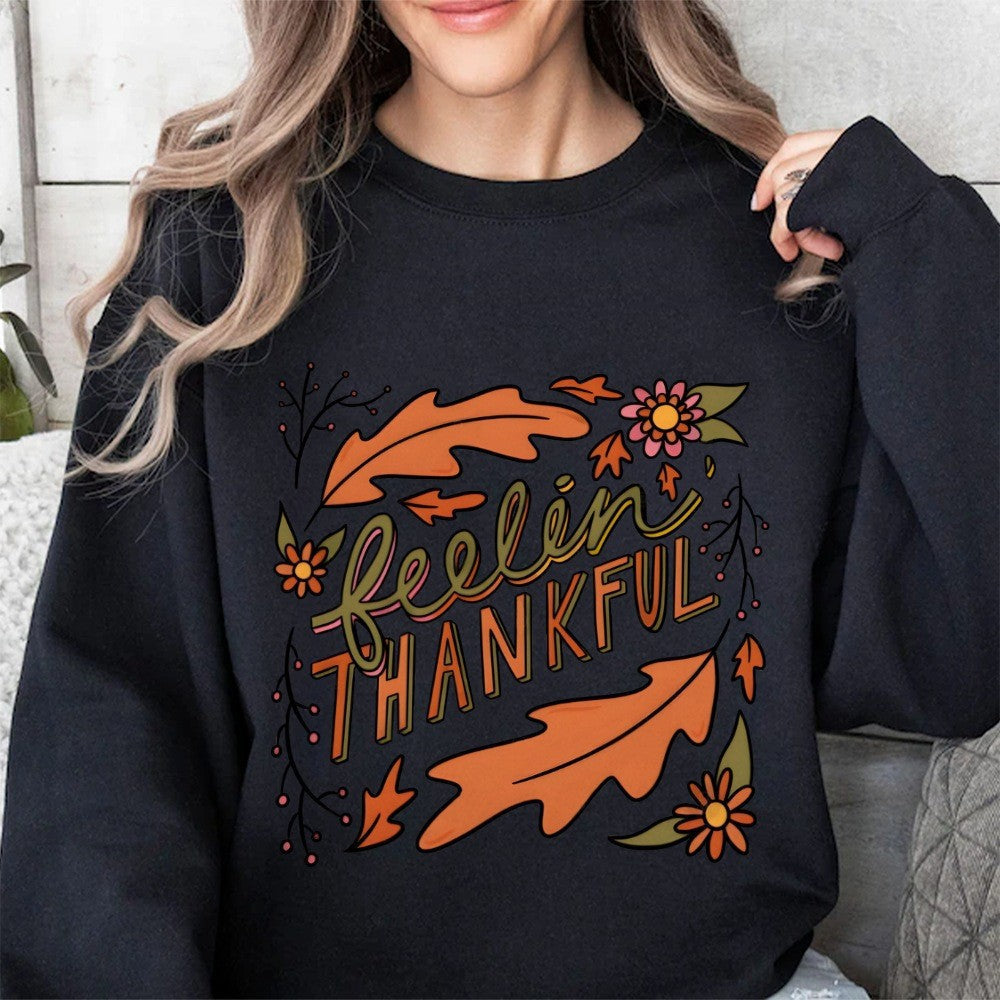 Sweatshirt pour femmes avec motif automnal coloré et inscription inspirante