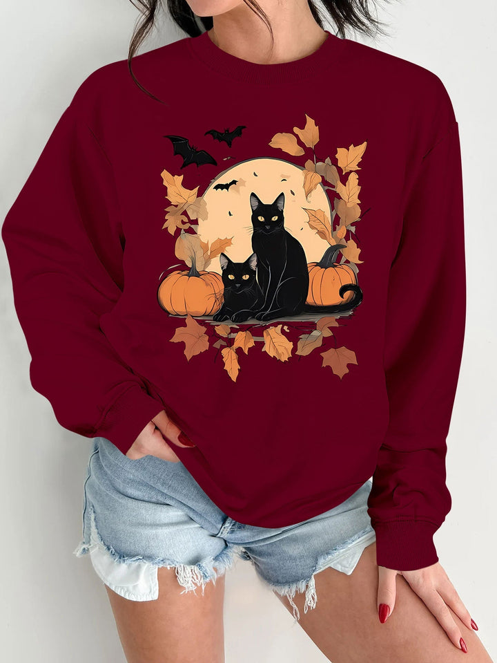 Sweatshirt pour femmes avec un design automnal de chats et de citrouilles