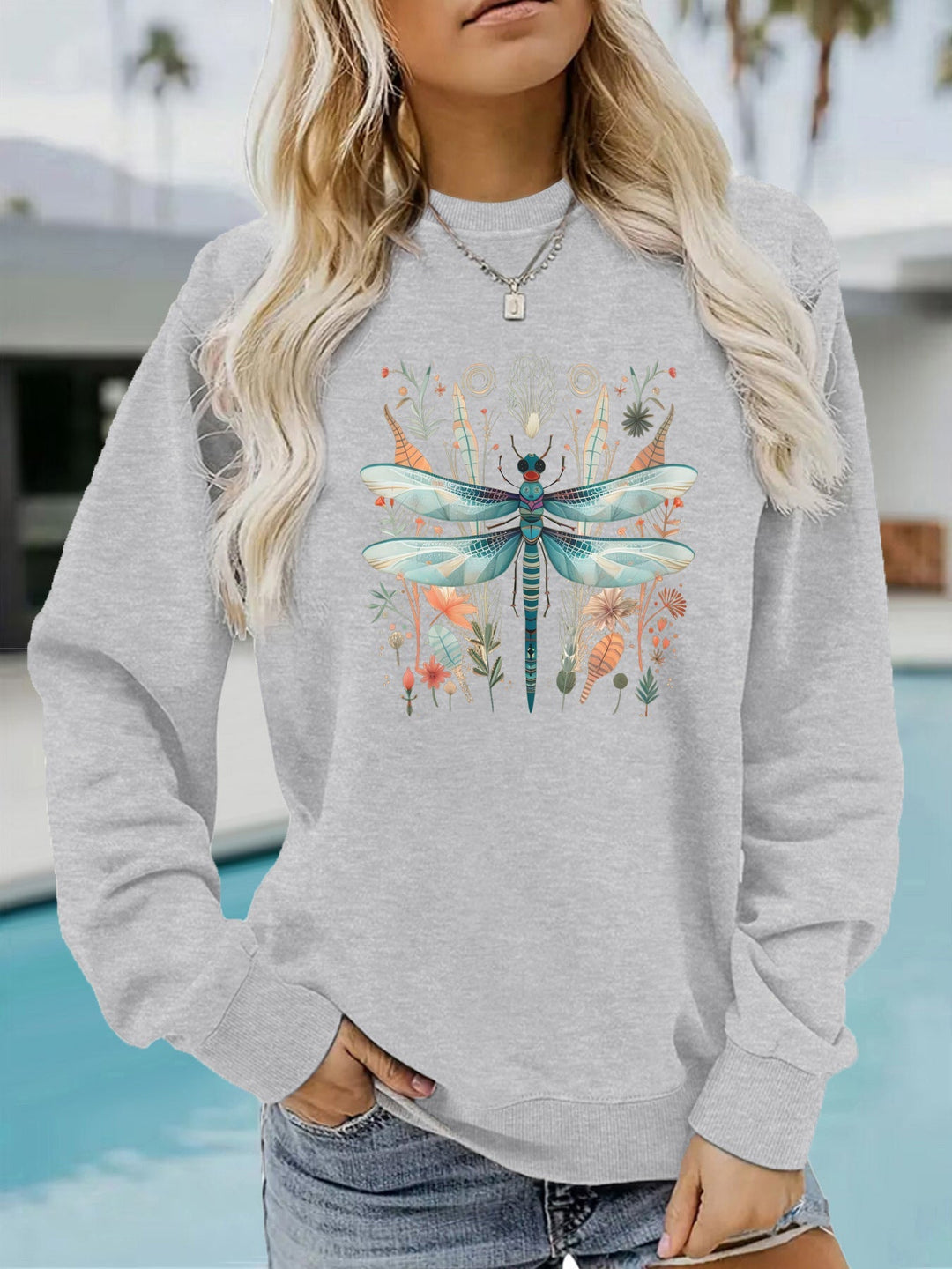 Sweatshirt pour femmes avec un imprimé unique de libellules et un design botanique