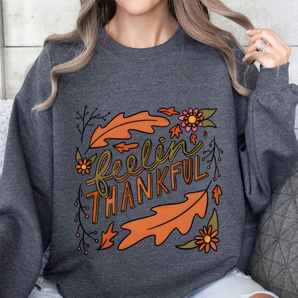 Sweatshirt pour femmes avec motif automnal coloré et inscription inspirante