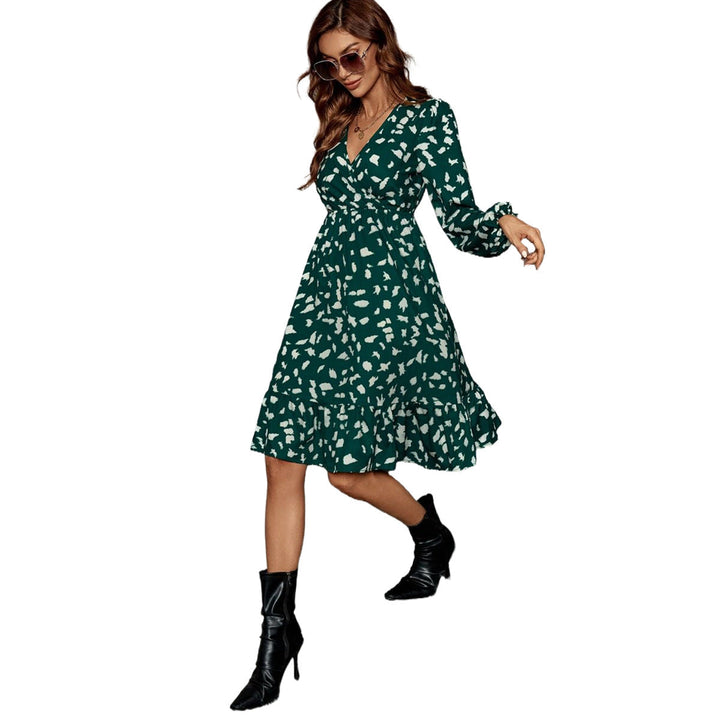 Robe midi élégante pour femmes avec décolleté en V et manches volumineuses