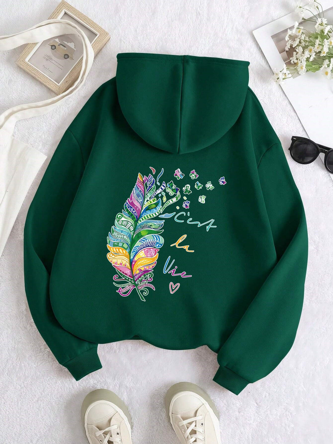 Sweat à capuche décontracté pour femmes avec design de plumes colorées et inscription inspirante