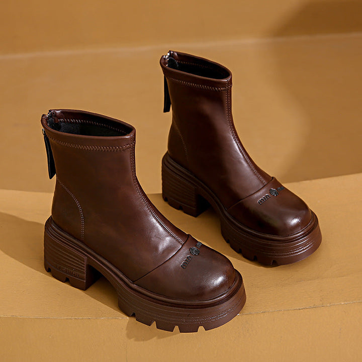 Bottines pour femmes avec un robuste talon bloc et une fermeture éclair moderne