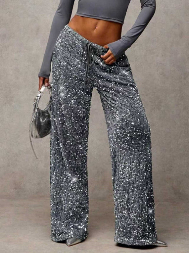 Pantalon palazzo extravagant pour femmes avec ornements en sequins
