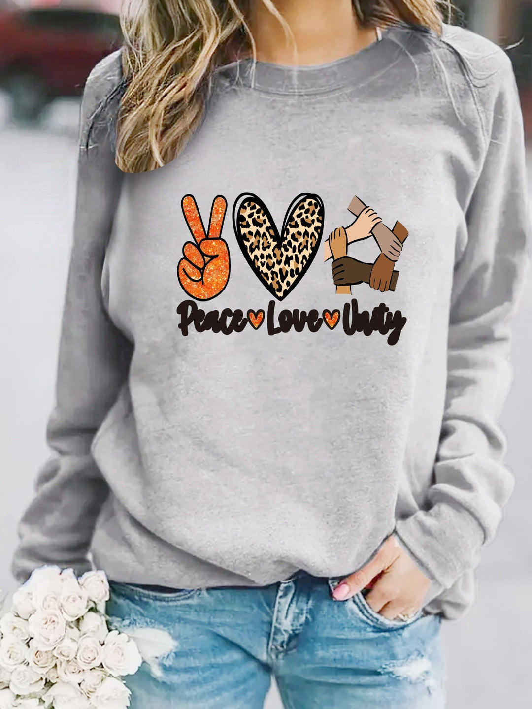 Sweat-shirt pour femmes avec un motif créatif de Paix, Amour et Unité