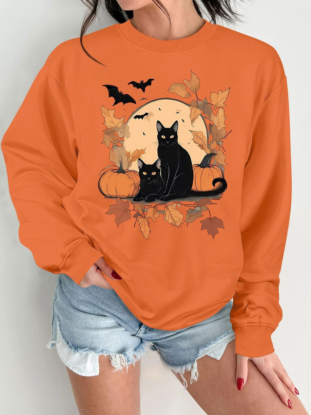 Sweatshirt pour femmes avec un design automnal de chats et de citrouilles