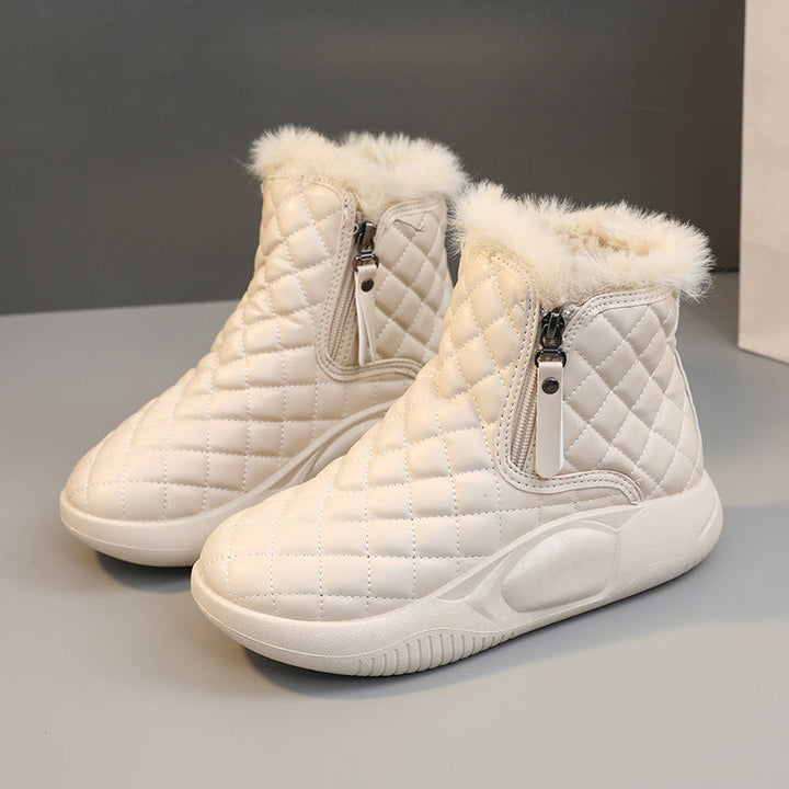 Bottes d'hiver chaudes pour femmes avec un matelassage à la mode et une fermeture éclair pratique