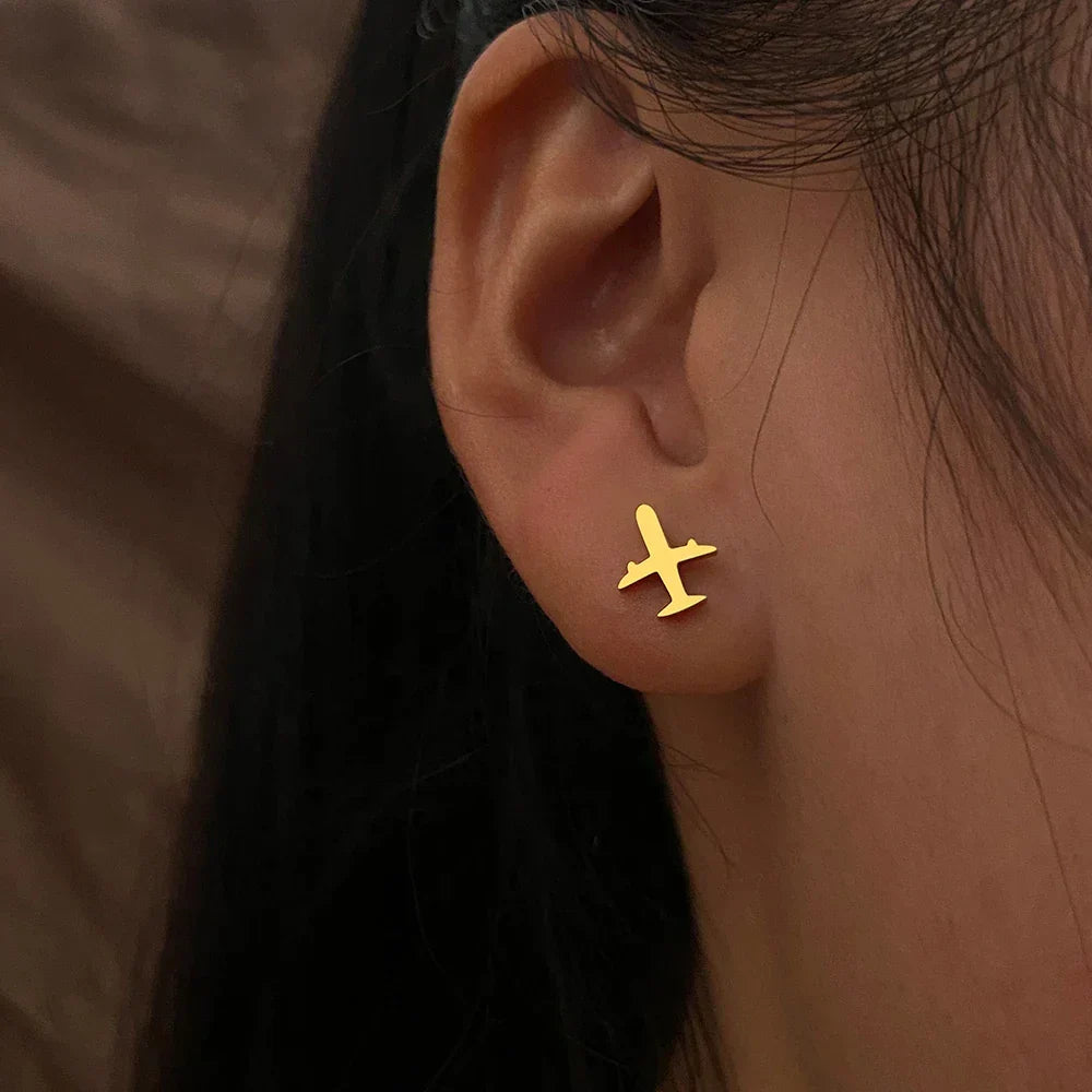 Boucles d'oreilles en forme d'avion doré