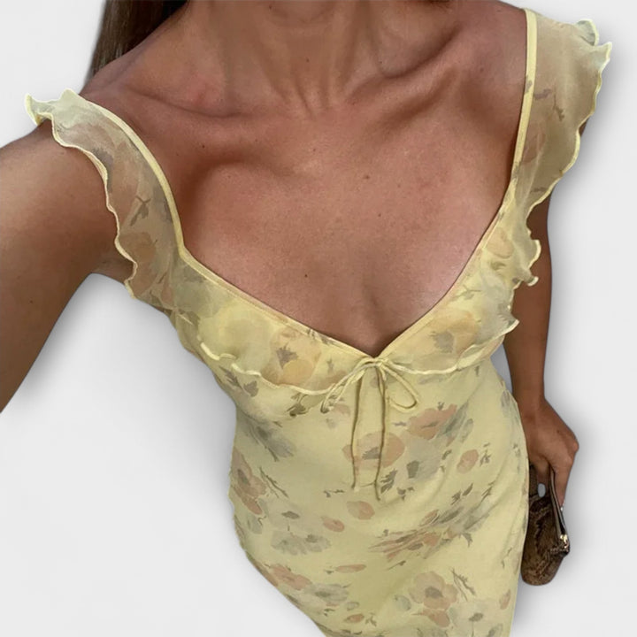 Robe maxi avec un motif floral mystérieux et un décolleté plongeant