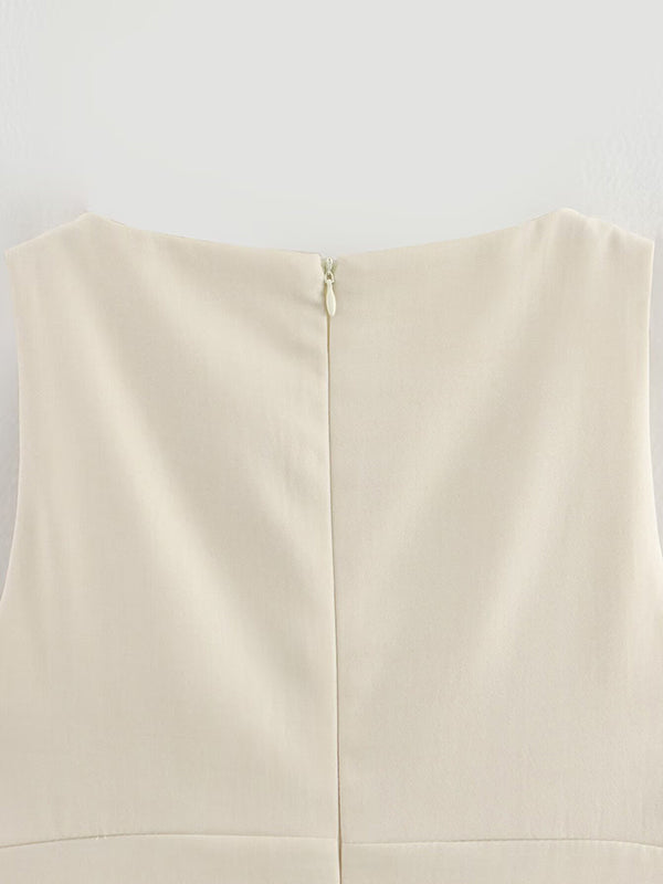 Robe courte ample plissée coupe trapèze, à empiècements, à fermeture éclair, à col rond, couleur unie