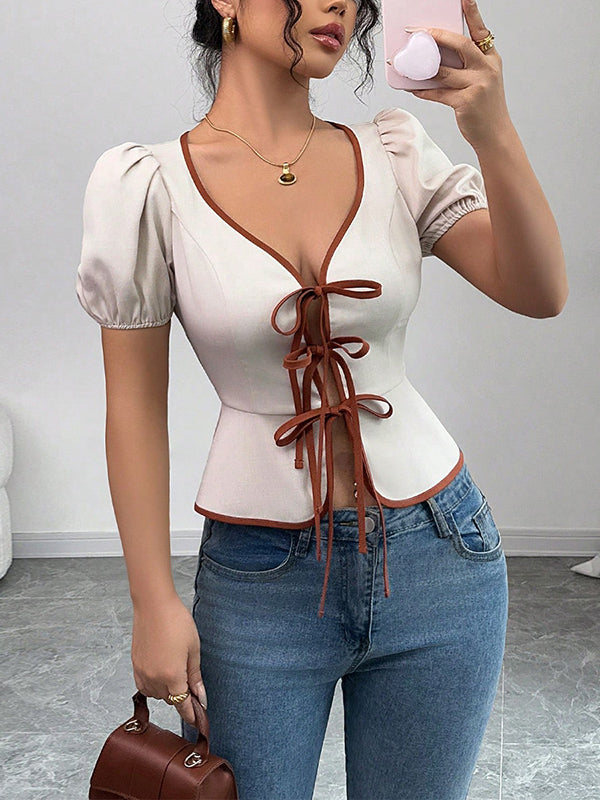 Chemisier plissé noué ample à taille élastique, à manches bouffantes, à col en V