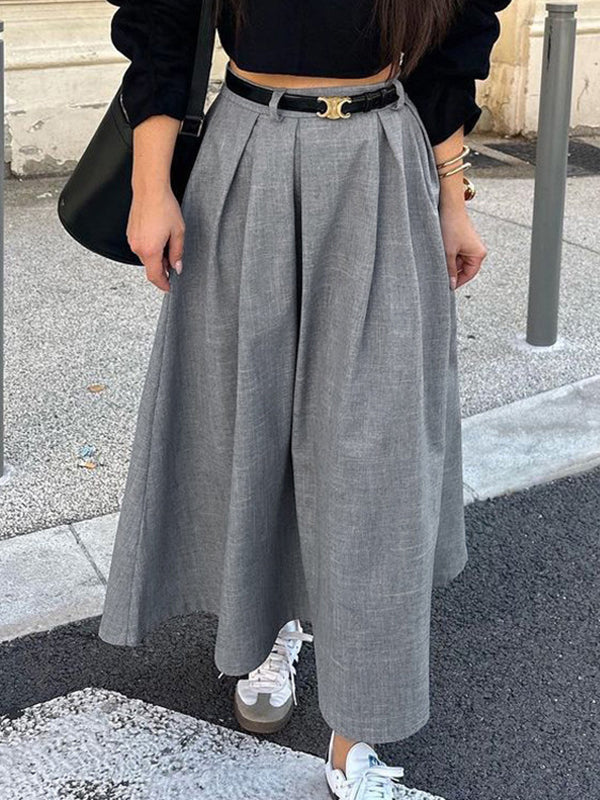 Jupe plissée coupe trapèze, taille haute, sans ceinture, couleur unie
