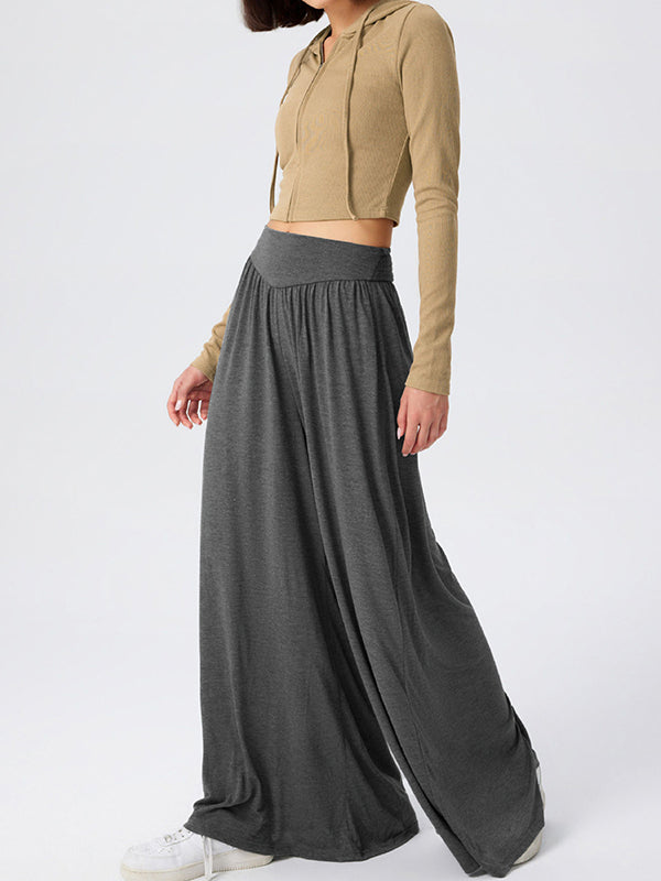 Pantalon ample plissé taille haute, à poches, à empiècements, couleur unie