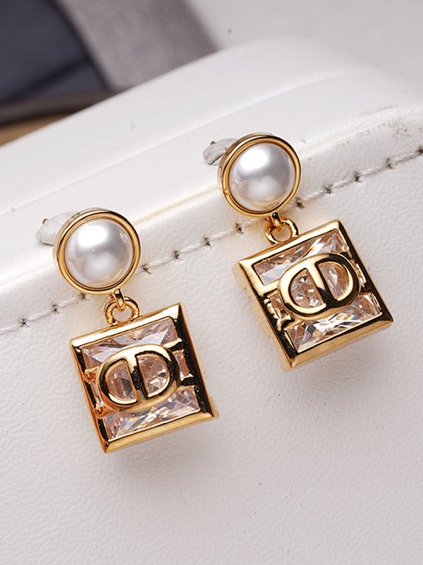 Boucles d'oreilles géométriques couleur contrastée